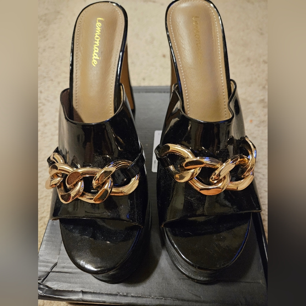 Black platform heels with gold chain